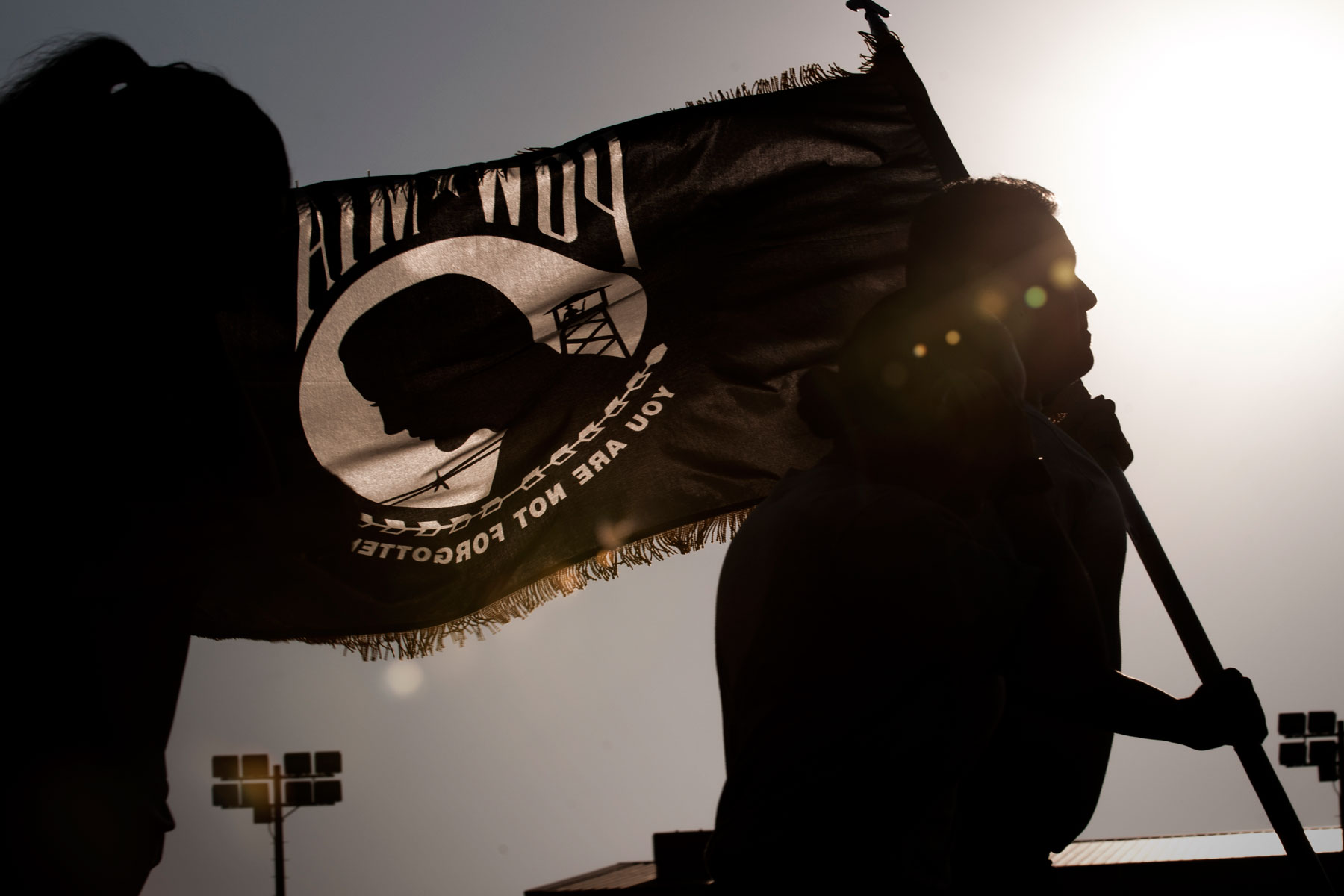U.S. Air Force Airmen run with the Prisoner of War and Missing in Action flag during the POW/MIA Recognition Day at Kunsan Air Base, Republic of Korea, Sept. 14, 2017. (U.S. Air Force photo by Staff Sgt. Victoria H. Taylor)