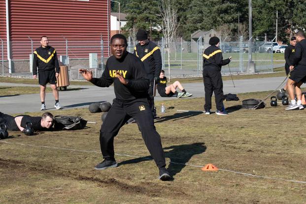 Soldiers execute the sprint-drag-carry portion of the ACFT.