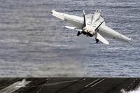 A Super Hornet launches from the Theodore Roosevelt