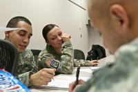 Service members studying together