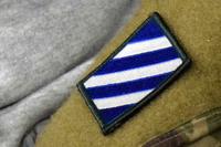 The blue and white patch of the U.S. Army’s 3rd Infantry Division.