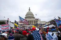 Rioters loyal to President Donald Trump gather on the West Front of the U.S. Capitol