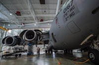 A C-17 Globemaster III assigned to the 176th Wing sits inside a hangar for a home-station check at Joint Base Elmendorf-Richardson, Alaska.